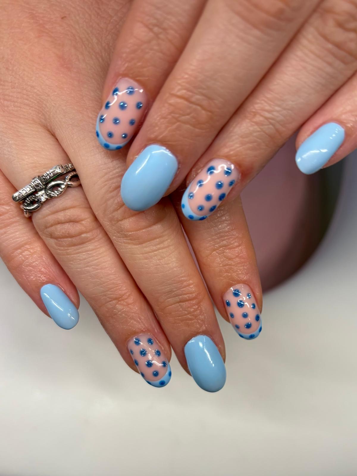 Blue gel with dot nail art