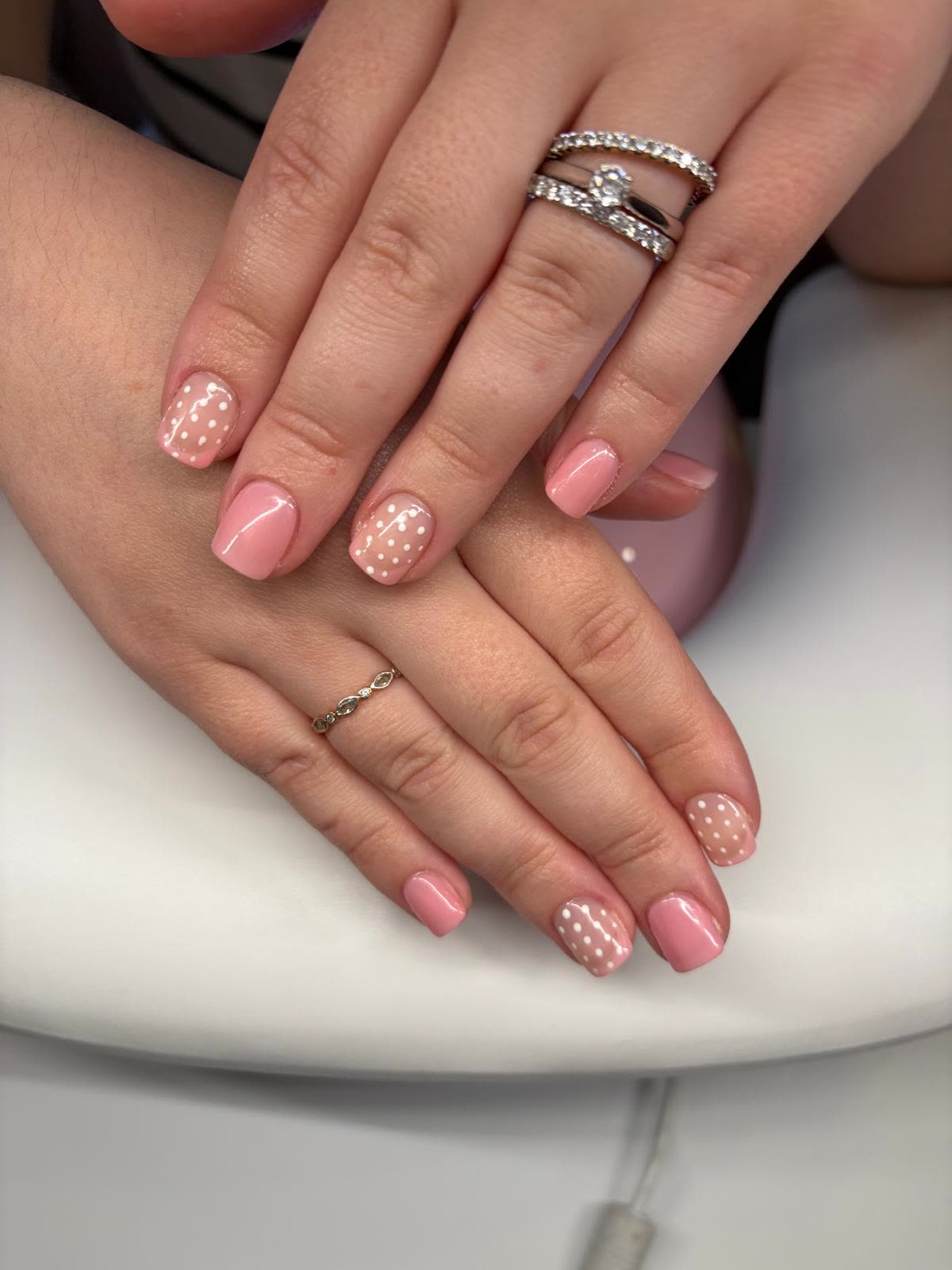 Pink gel with white dot nail art